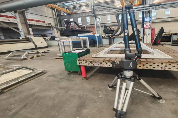ALPHA articulating-arm CMM inspecting a vacuum-grade part